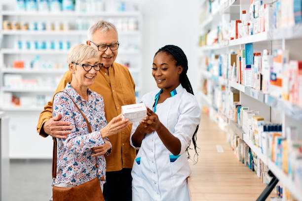 Senior medication management red flags checklist with caregiver ready to call a pharmacist while an older adult rests